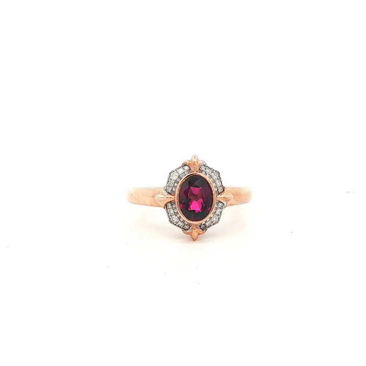 9ct rg rhodolite garnet and diamond ring
