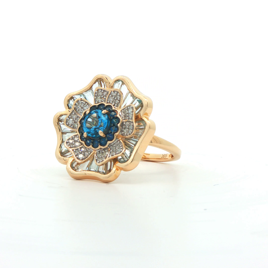9ct Yellow Gold Swiss Blue Topaz, Sky Blue Topaz, Blue Sapphire And Diamond Ring