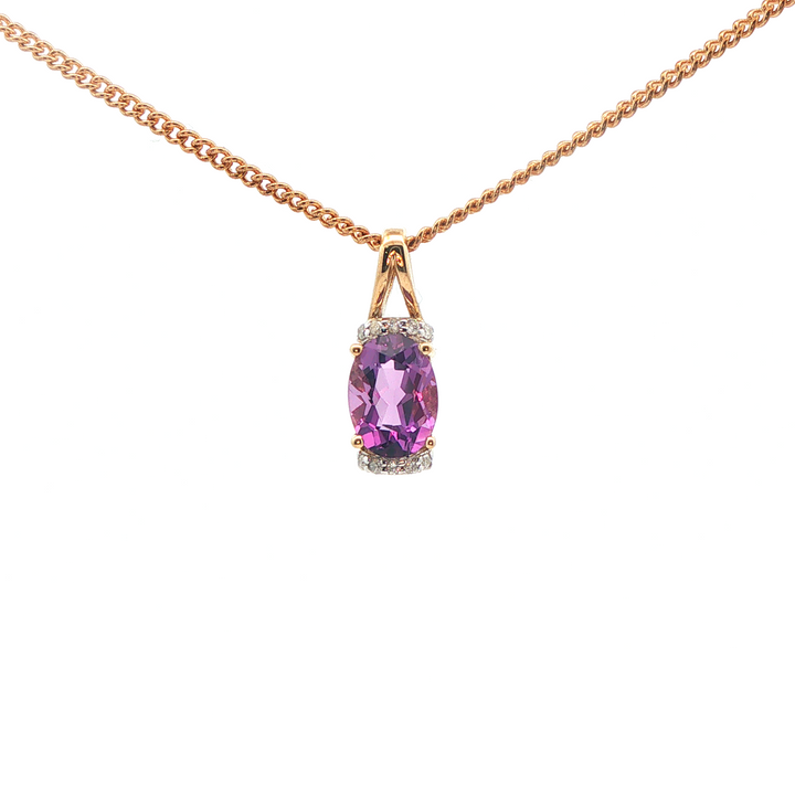 9ct yg oval amethyst and diamond pendant