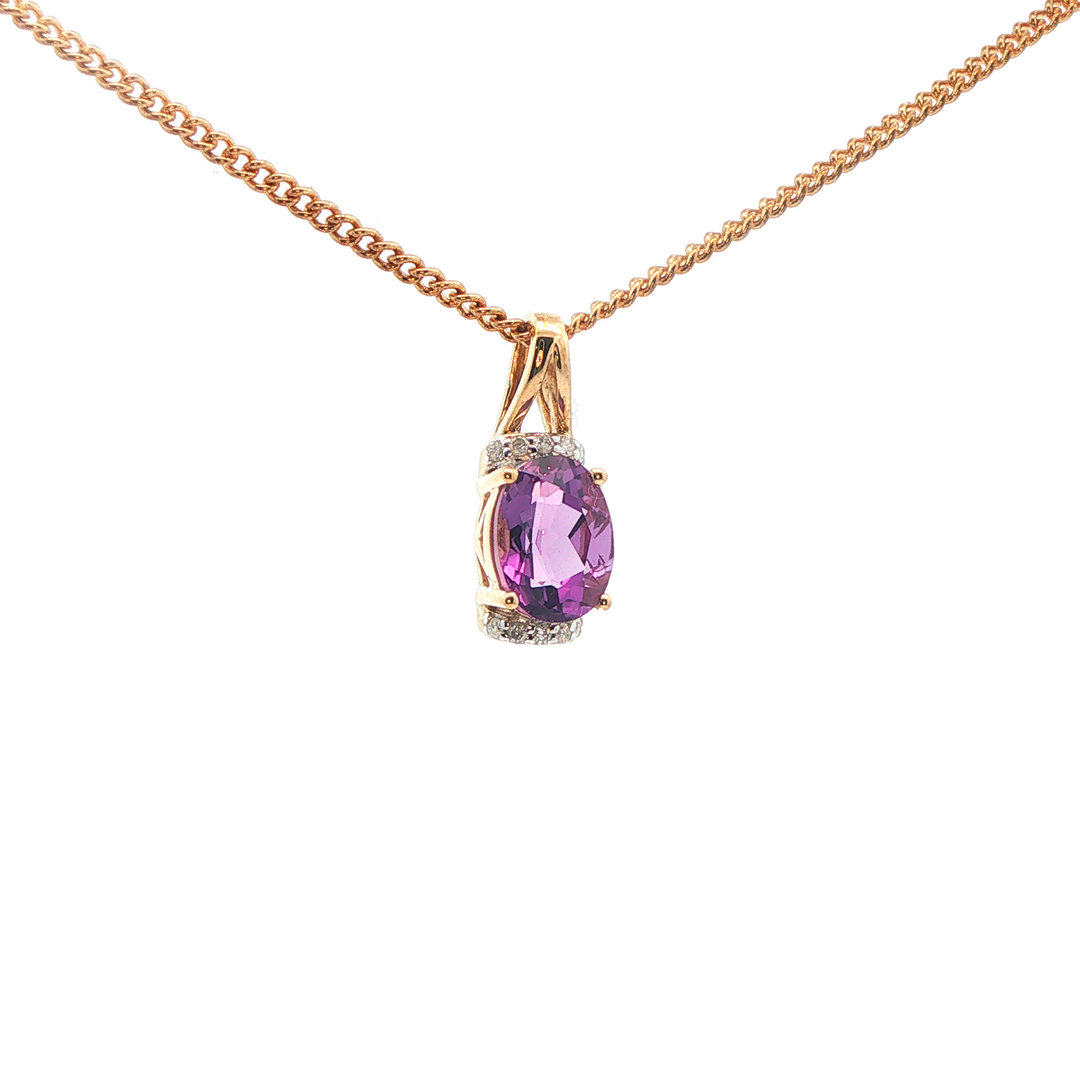 9ct yg oval amethyst and diamond pendant