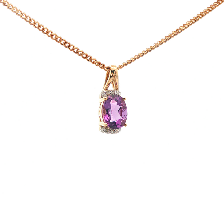 9ct yg oval amethyst and diamond pendant