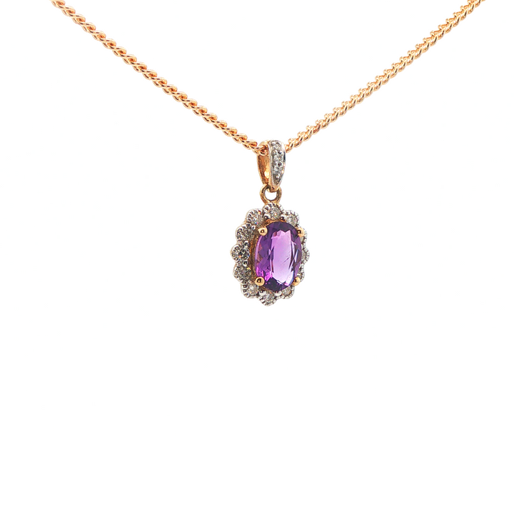 9ct yg diamond and oval amethyst pendant