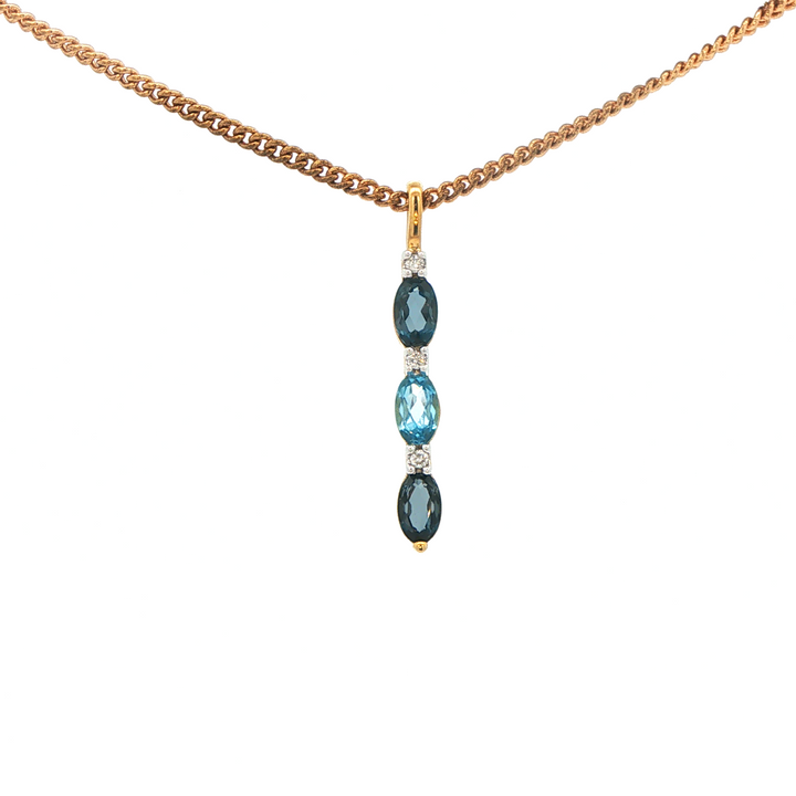 9ct 3 tone blue topaz pendant