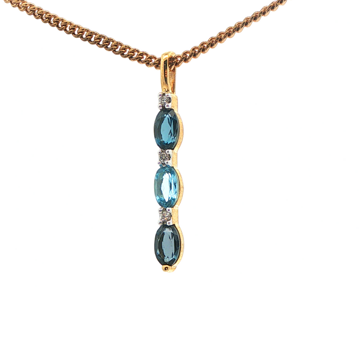 9ct 3 tone blue topaz pendant
