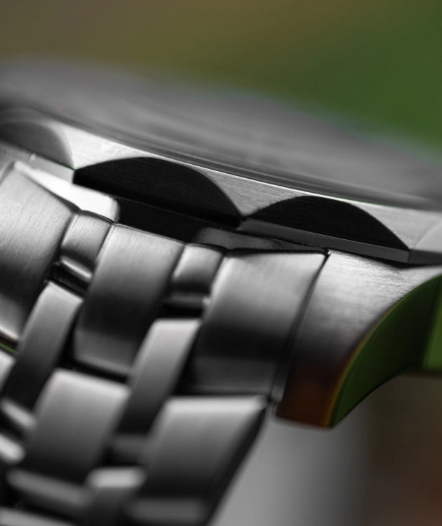 Inspired by the Vilnelė River, an elegant, solar-powered timepiece that balances natural grace with effortless practicality.