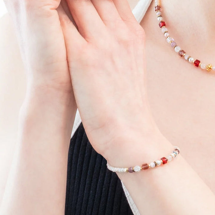 CDL Bracelet. Natural Lepidolite, rose quartz, rock crystal, synthetic tiger's eye, Swarovski Crystals & Crystal Pearls, haematite w/ titanium oxide finish, cut glass & gold plated stainless steel.